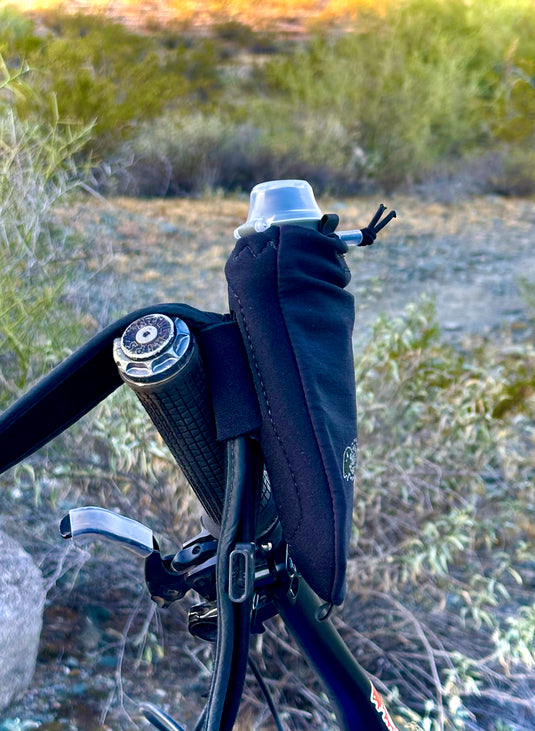 Add-on flask pockets for backpacks.