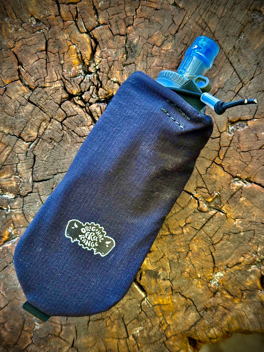 Add-on flask pockets for backpacks.